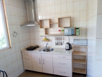 Гостевой дом «Донбас» - номер Семейный с кухней-студией фото 6