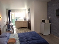 Апартаменты «Snug House» - номер Студия «Ирис» фото 4