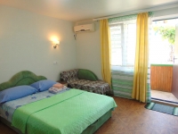 Апартаменты «Snug House» - номер Апартамент «Мята» фото